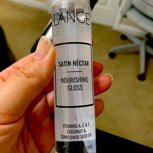 Open bottle of L’ange nectar gloss (used one drop)